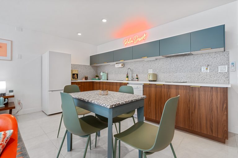 Blue Condo dining table and kitchen