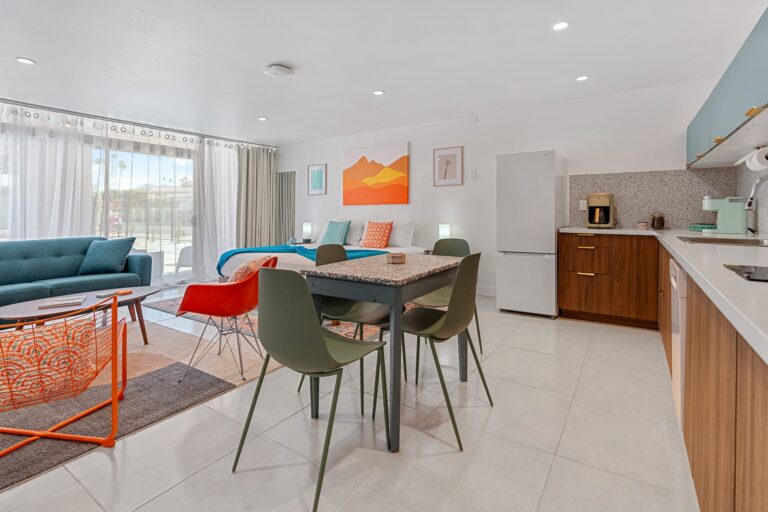 Blue condo dining table and open studio