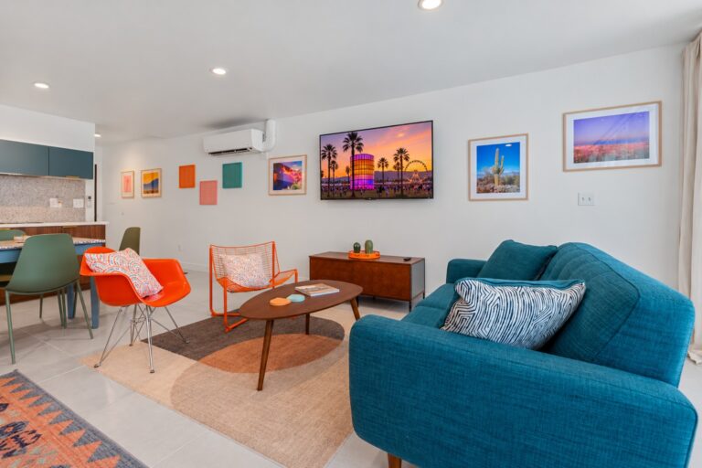 Blue condo mid-century living room