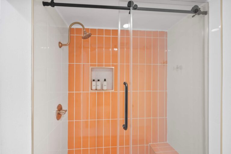 Blue condo walk-in shower