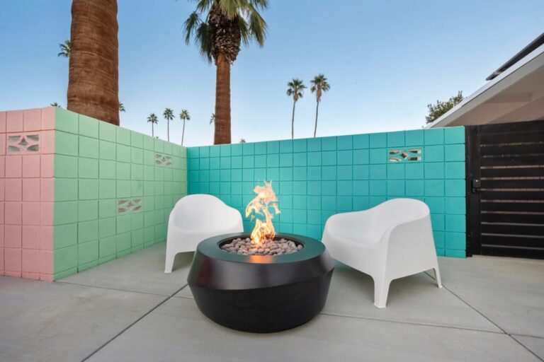 House fire pit lounge by the teal wall