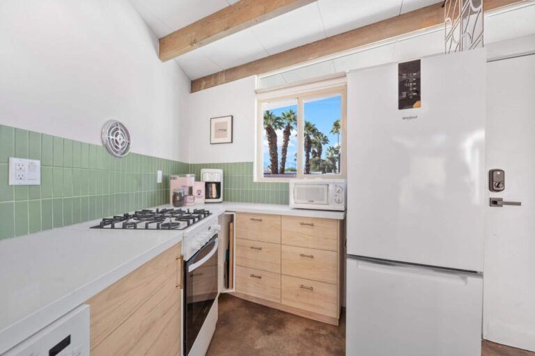 House kitchen with stove and fridge