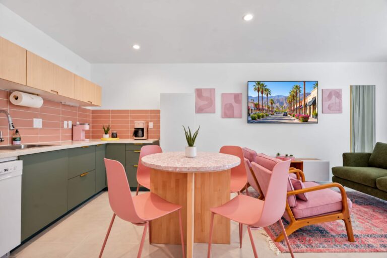 Pink condo terrazzo dining table, kitchen and TV
