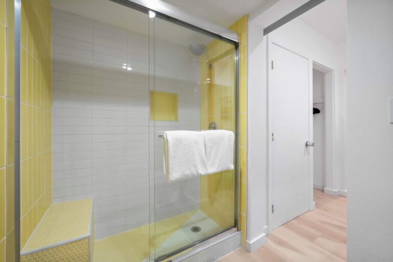 Yellow condo glass-door shower